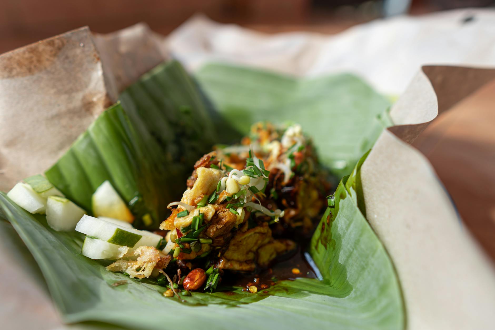 cooked food on green vegetable