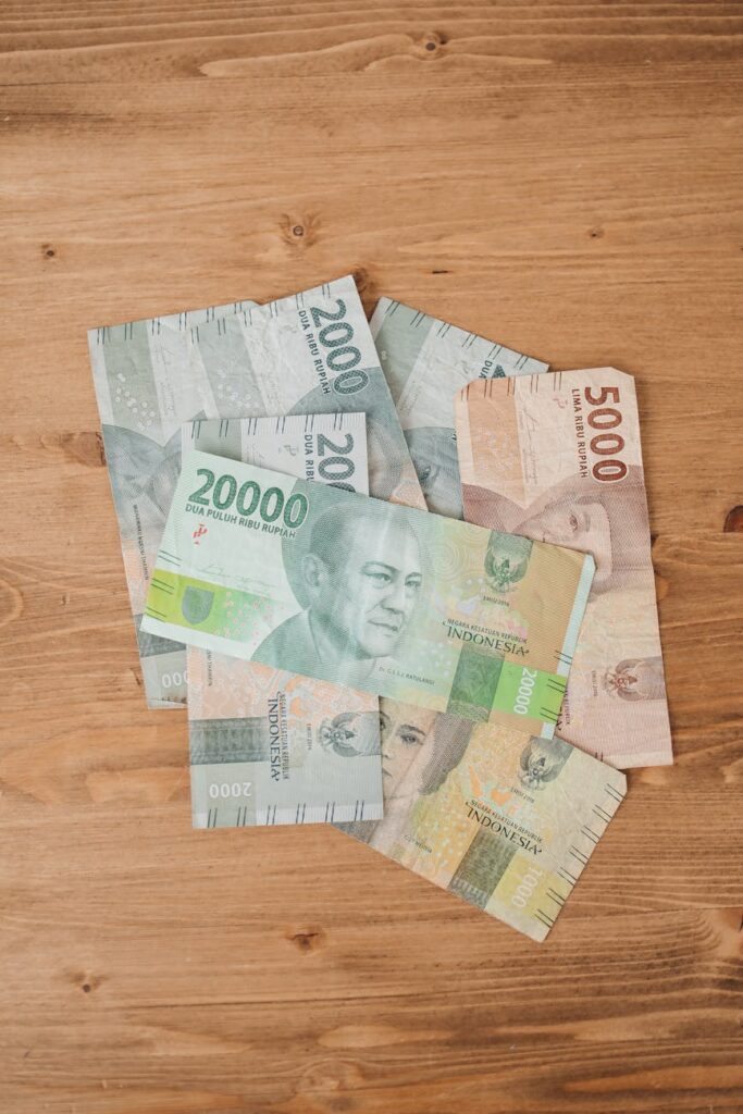 a paper money on a wooden table