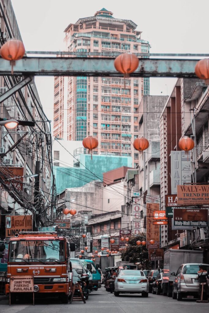 cars on road near buildings